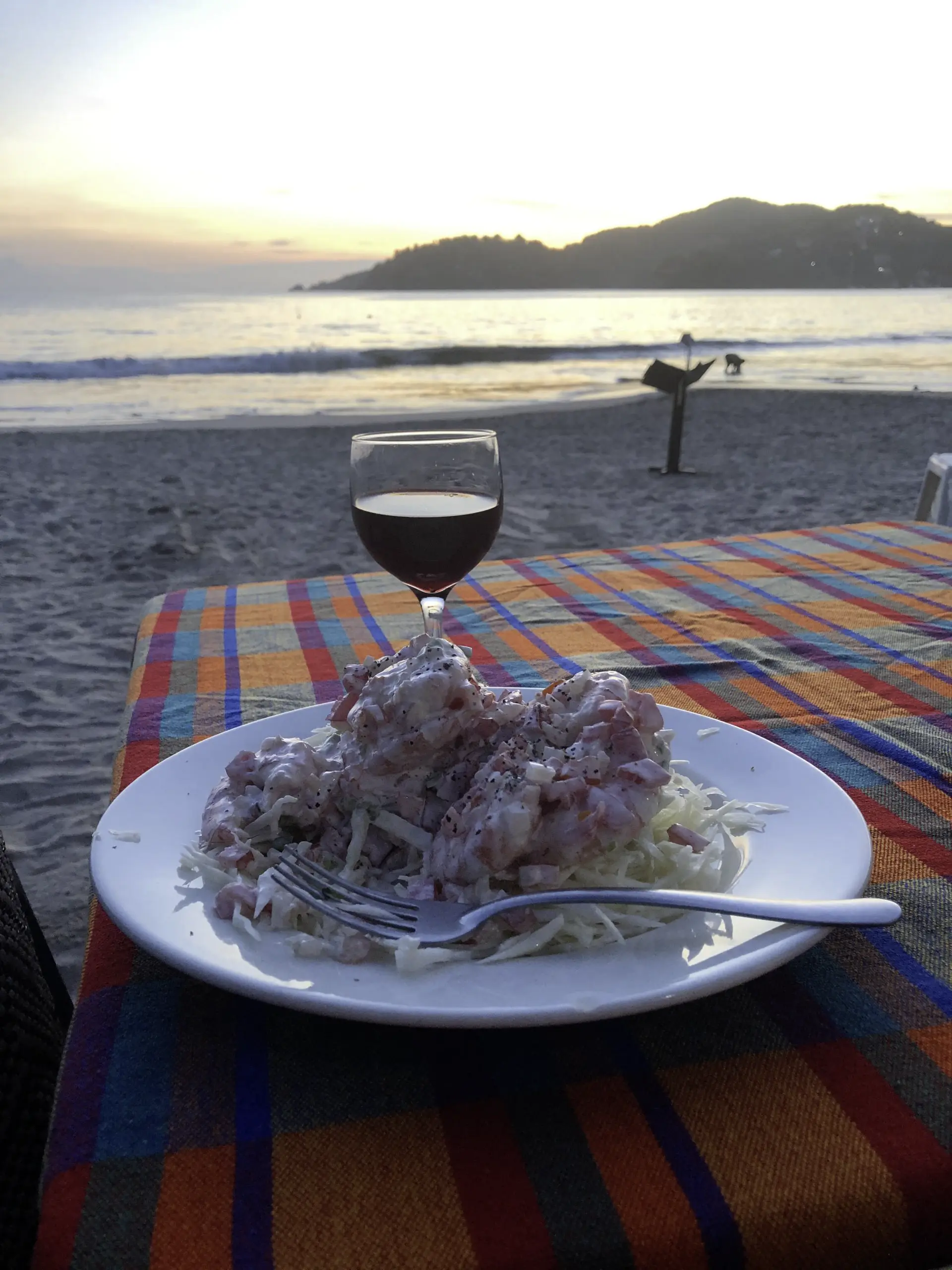 Sunset with wine - click to enlarge Dining at La Ropa Beach